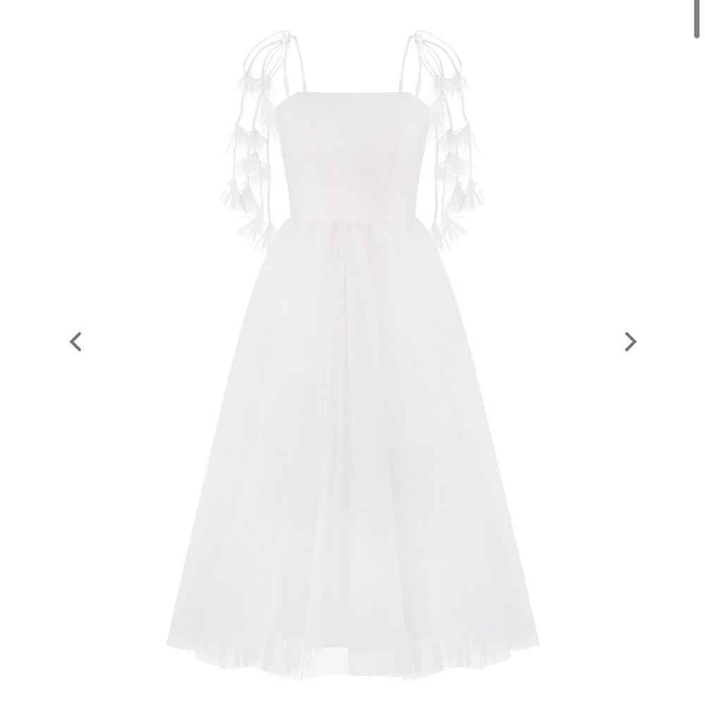 White sparkle tulle midi length dress. Tied shoulders, bow on the back.